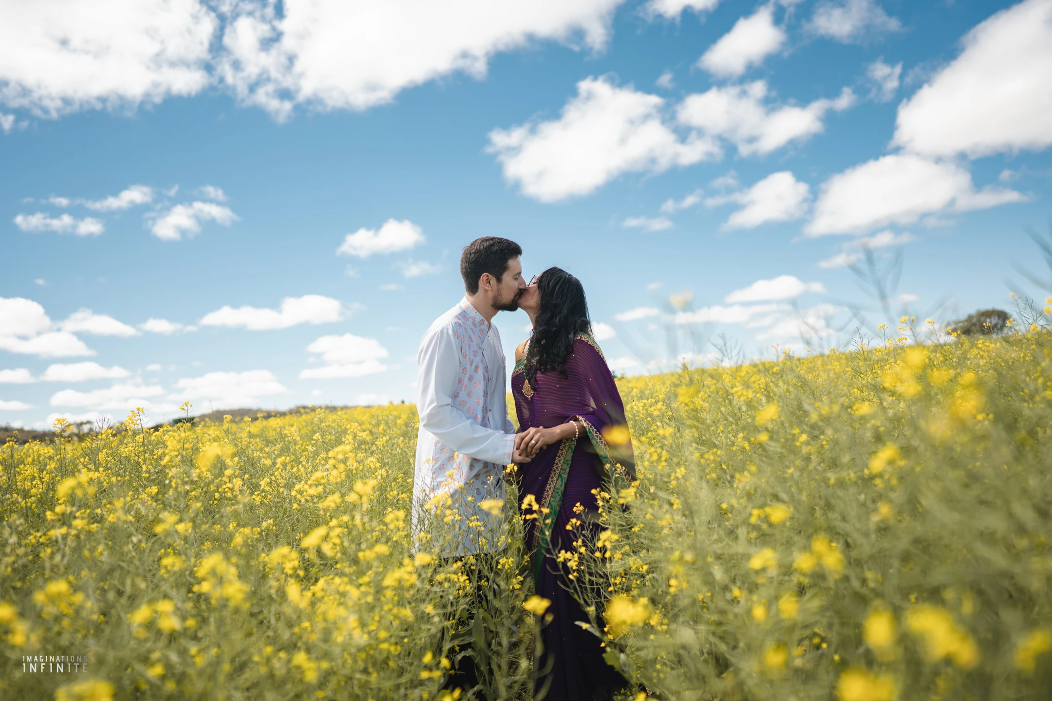 Home 14 Marrygold Weddings #1 Wedding photography and videography in Perth couple kiss yellow canola field blue sky Marrygold Weddings #1 Wedding photography and videography in Perth
