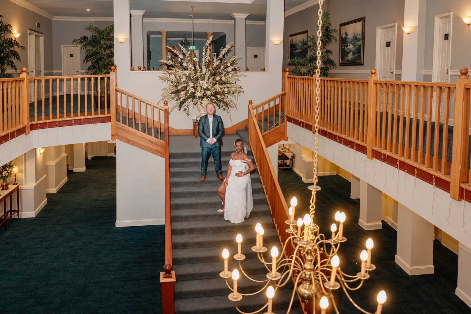 Home 5 Marrygold Weddings #1 Wedding photography and videography in Perth english couple staircase chandelier portrait perth Marrygold Weddings #1 Wedding photography and videography in Perth