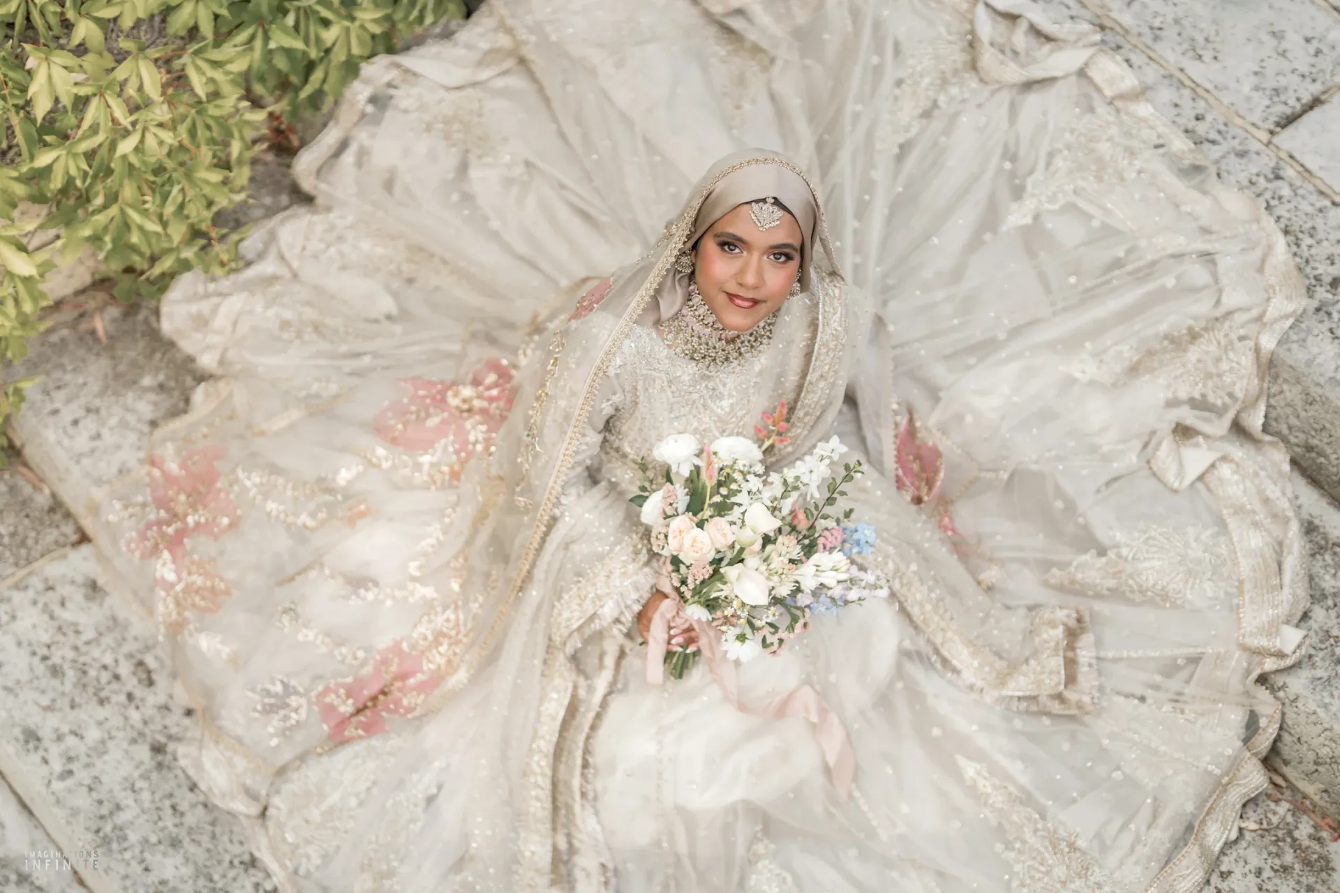 perth bride cream embellished gown hijab overhead bouquet Marrygold Weddings #1 Wedding photography and videography in Perth