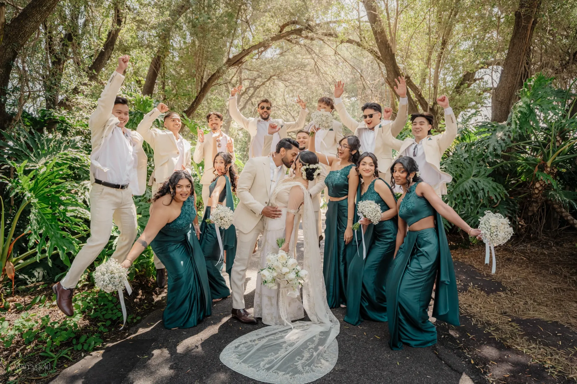 english wedding party jumping green bridesmaid dresses garden Marrygold Weddings #1 Wedding photography and videography in Perth